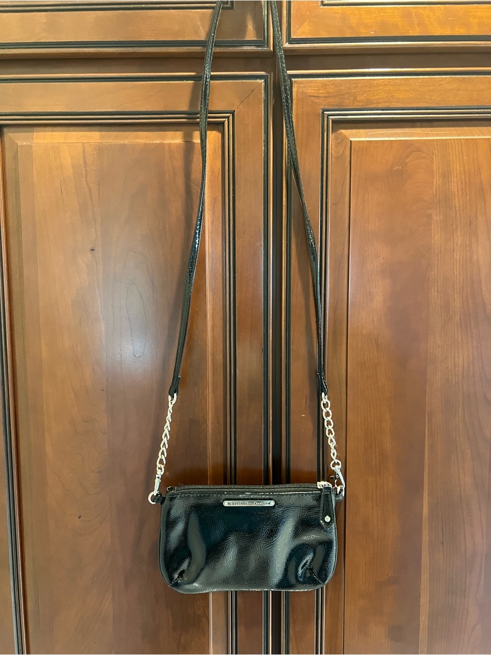 Kathy Van Zeeland Crossbody Bag Black Patent Signature Name Plate
